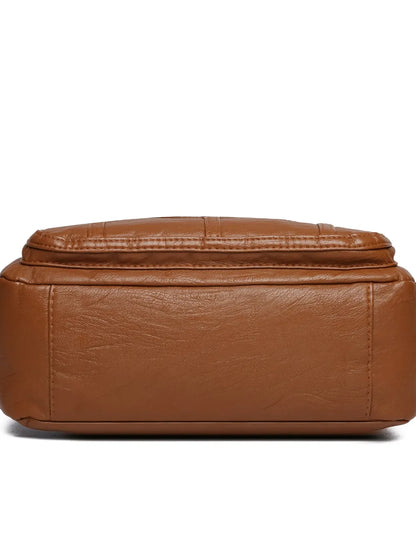 Crossbody-/Umhängetasche mit mehreren Fächern.